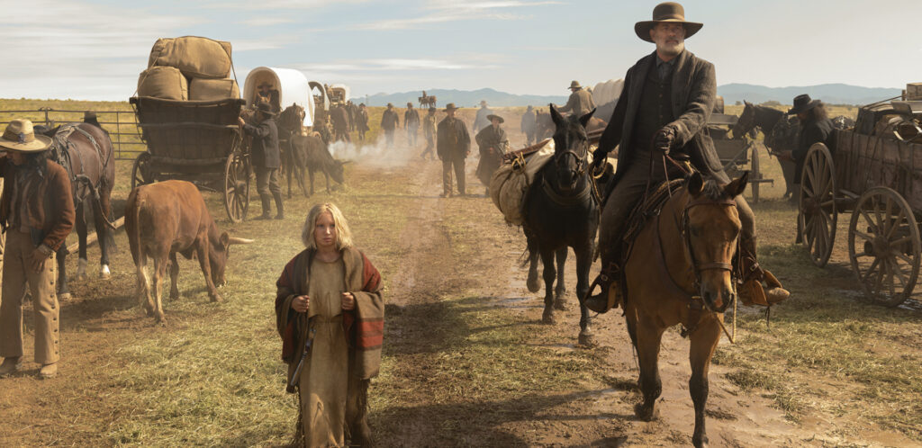 Left Johanna Leonberger (Helena Zengel) and Captain Jefferson Kyle Kidd (Tom Hanks) in News of the World, co-written and directed by Paul Greengrass.